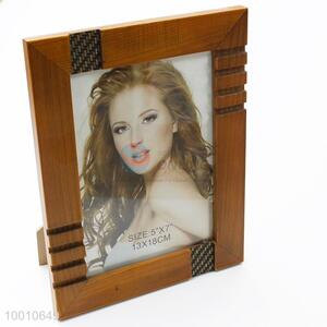 Wooden <em>photo</em> <em>frame</em> with carved pattern